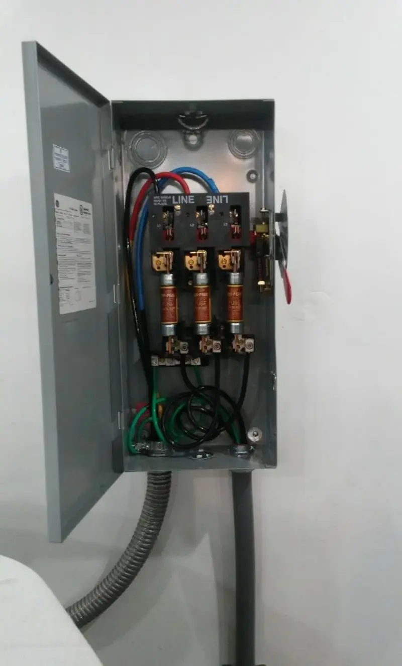 Three-phase disconnect switch installed for Smoke Detector Installation in East Milton